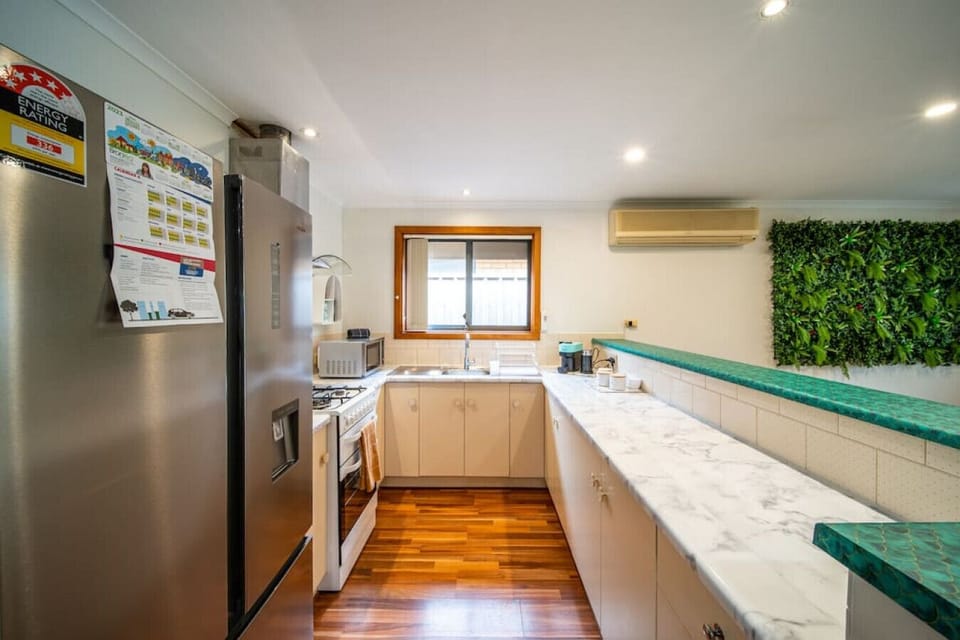 The fully equipped kitchen makes shared meals effortless, with generous bench space, modern appliances and generous preparation space that make cooking and entertaining feel effortless.