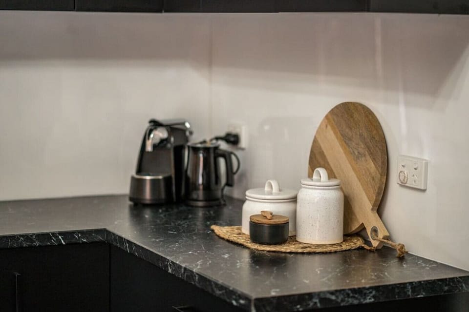 Enjoy the convenience of a Nespresso machine on hand, or step next door for your morning coffee from the local café.
