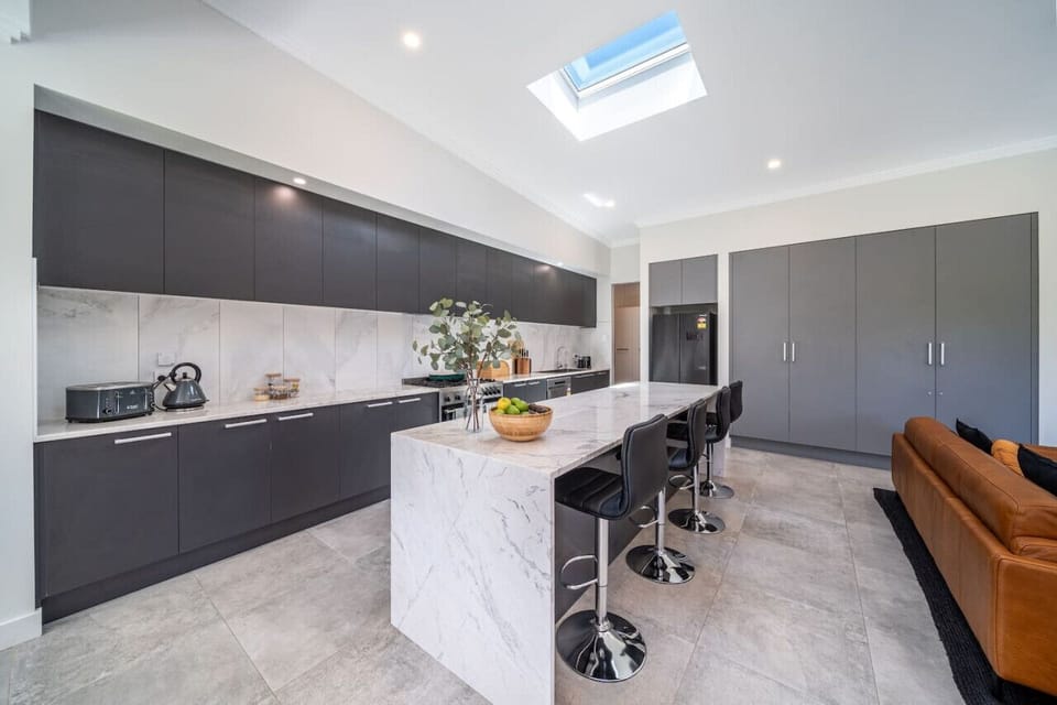 Prepare meals with ease in the fully equipped kitchen designed for convenience.
