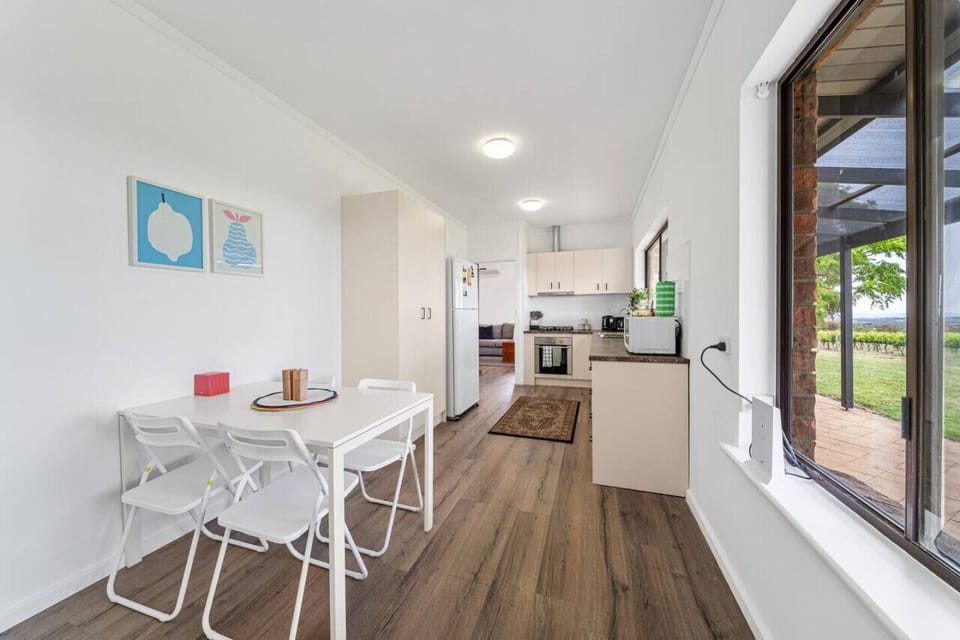 Enjoy a relaxed breakfast or coffee at the casual kitchen dining nook before heading out to explore nearby cellar doors.