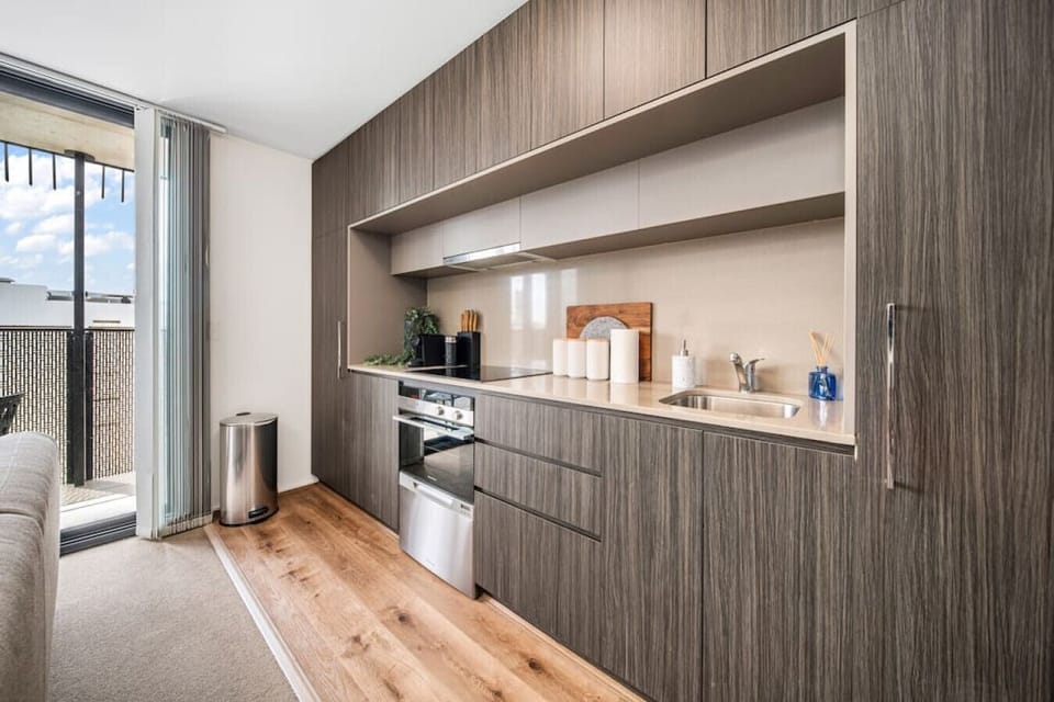 Enjoy easy meal prep or a quiet coffee moment in the well-appointed kitchen.
