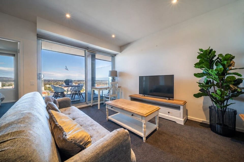 Relax into the comfortable sofa, which can be prepared as a sofa bed on request, while enjoying a quiet evening indoors or a movie on the TV.