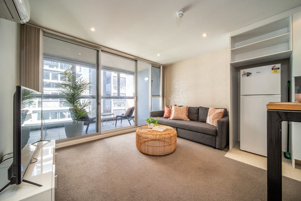 The sofa can be set up as a queen bed upon request, sleeping two additional guests.
