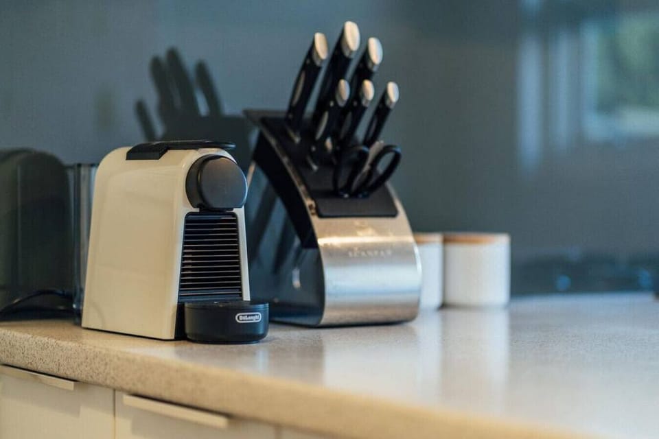 Start your day with a Nespresso brew from the fully equipped kitchen, stocked with essentials for effortless cooking.