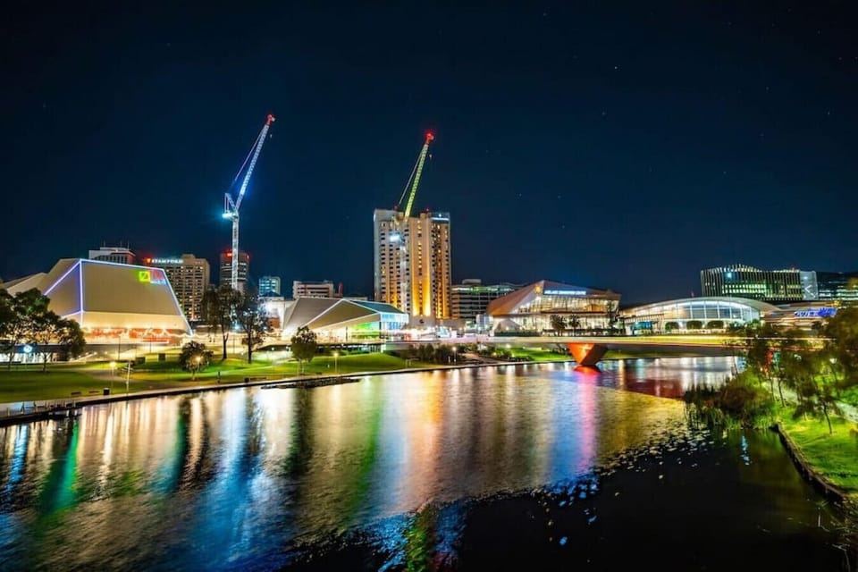 Experience Adelaide’s vibrant riverside and city lights as the evening comes alive nearby.