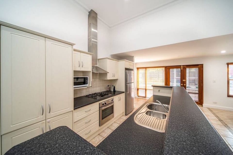 Cook with ease in the fully equipped kitchen designed for everyday convenience.
