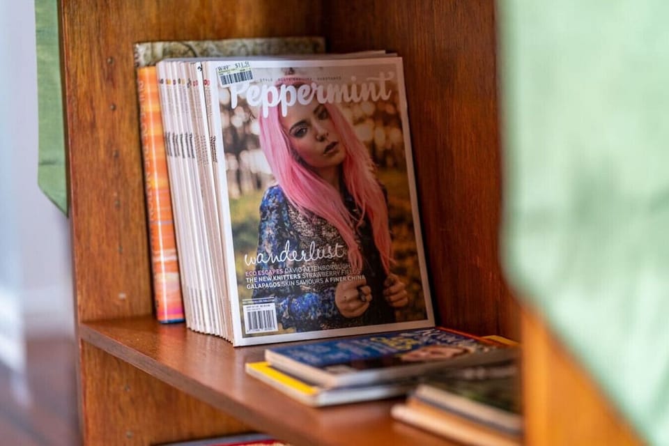 A well-stocked bookshelf adds a touch of character, offering plenty of reading material for guests to enjoy.