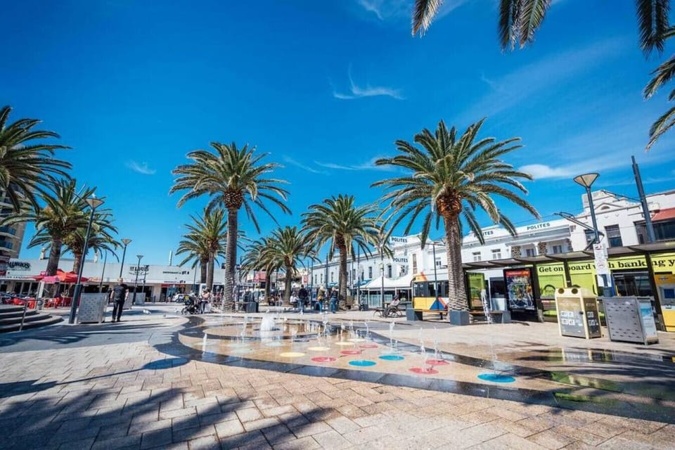 Soak up the lively coastal atmosphere beneath swaying palms, where cafés, shops, and open spaces invite you to wander, relax, and enjoy the heart of Glenelg.