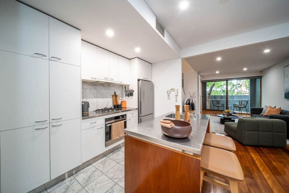 Open-plan living connects the lounge, kitchen and dining areas, creating an easy space to gather, cook and unwind together.