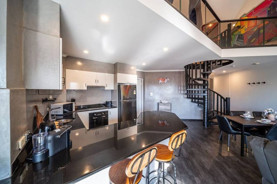 Prepare meals with ease in the fully equipped kitchen, complete with modern appliances and a Nespresso machine for your morning coffee.