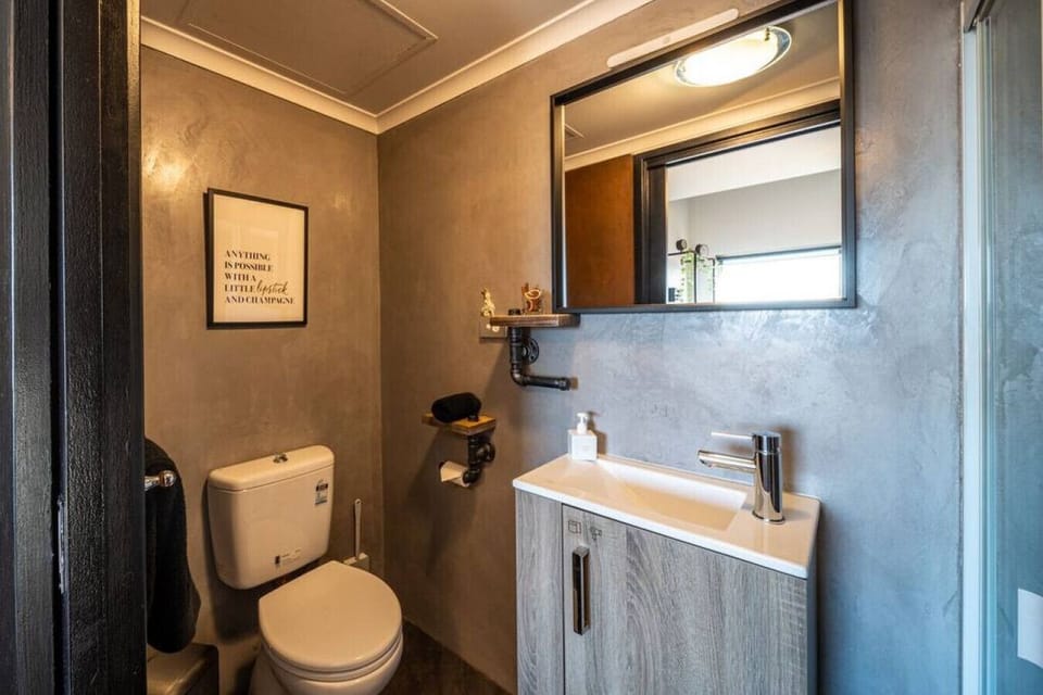 The compact ensuite provides a private space to start or end the day.