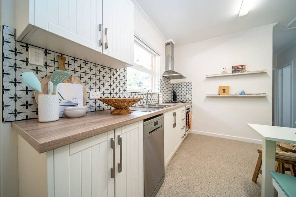Cook with ease in the fully equipped kitchen, complete with modern appliances and thoughtful touches.