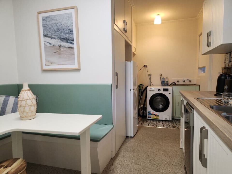 Take care of everyday essentials with a convenient internal laundry just off the kitchen.