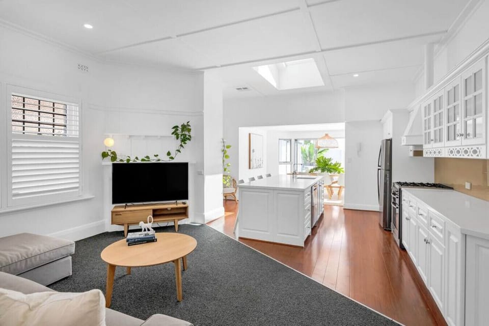 A bright and welcoming lounge, complete with a spacious open-plan layout.