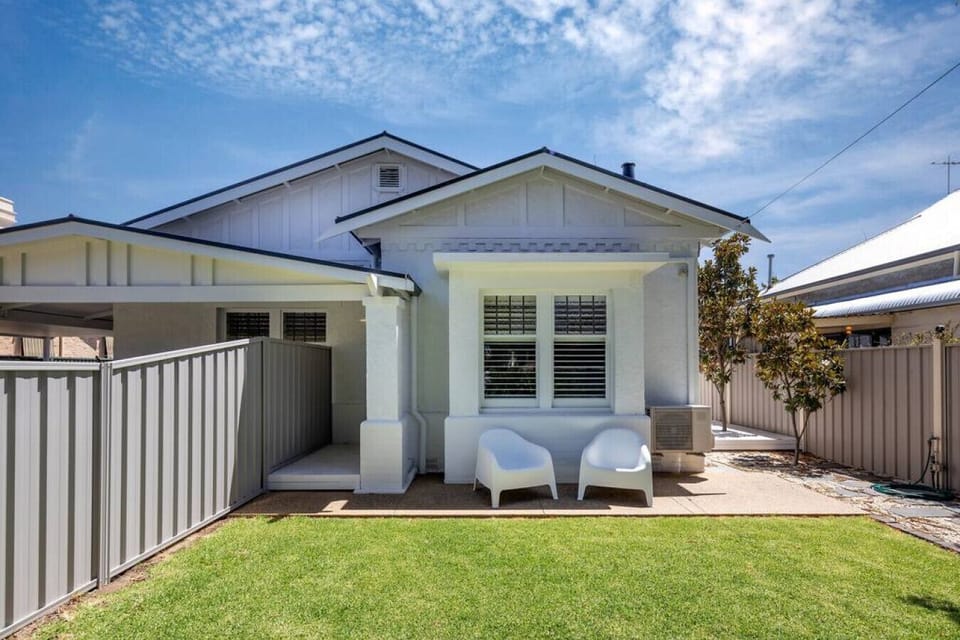 Step through the private entry courtyard and into a peaceful coastal retreat designed for easy beachside stays.