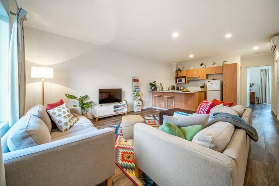 Flow easily through the open-plan living and kitchen space, keeping everyone connected.