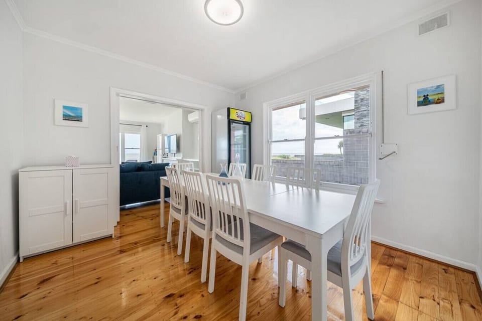 Gather around the dining table to share relaxed meals and plan the next day’s seaside adventures.
