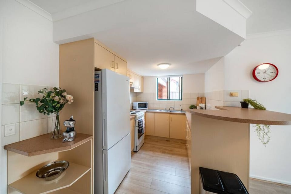 Cook with ease in a fully equipped kitchen complete with modern appliances and thoughtful essentials.
