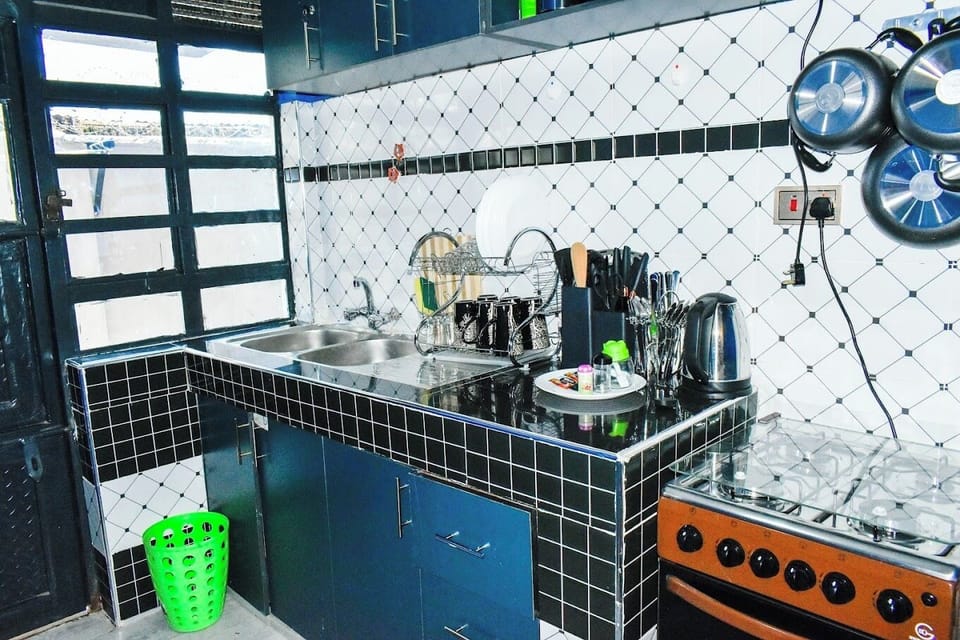 Family Apartment, City View | Private kitchen | Fridge, microwave, cookware/dishes/utensils
