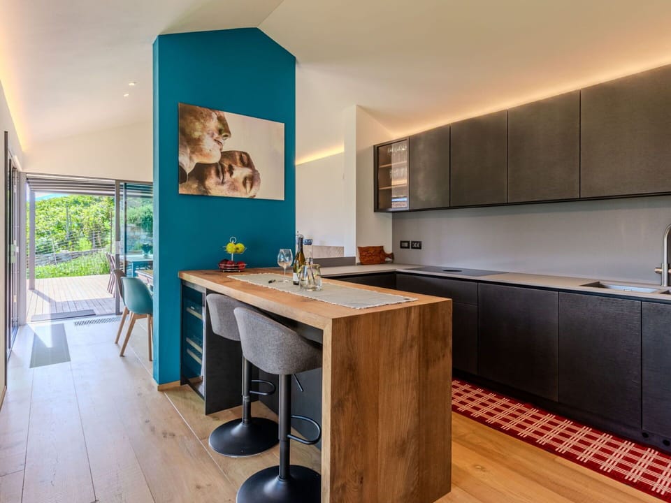 Furniture, Interior Design, Kitchen, Countertop, Flooring, Floor, Wood, Cabinetry, Ceiling, Kitchen Appliance