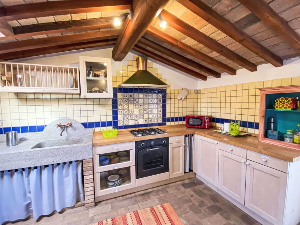 Kitchen, Flooring, Interior Design, Countertop, Wood, Kitchen Appliance, Major Appliance, Furniture, Floor, Ceiling