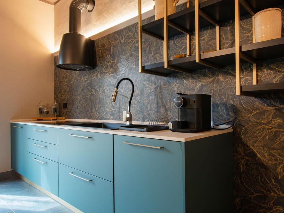 Kitchen, Countertop, Interior Design, Cabinetry, Flooring, Kitchen Sink, Kitchen Appliance, Plumbing Fixture, Lighting, Furniture