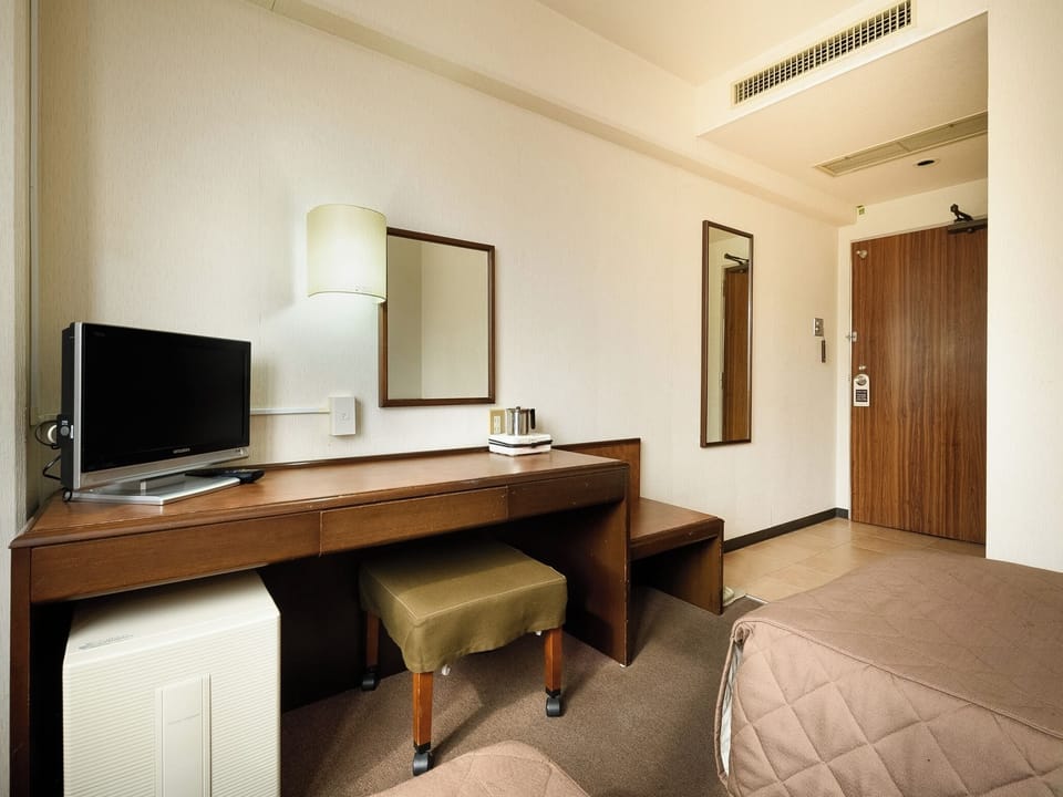 Desk, free WiFi, bed sheets