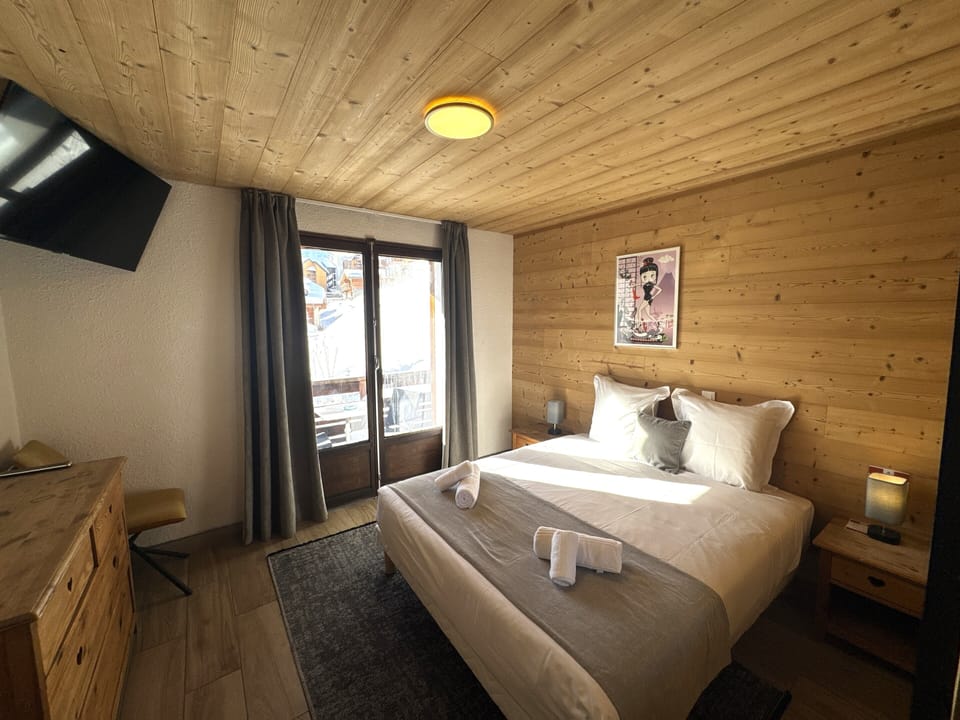 Family Quadruple Room, Balcony, Mountain View | In-room safe, laptop workspace, blackout drapes, iron/ironing board
