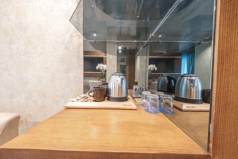 Suite | Living area | 90-inch Smart TV with cable channels, Netflix, streaming services