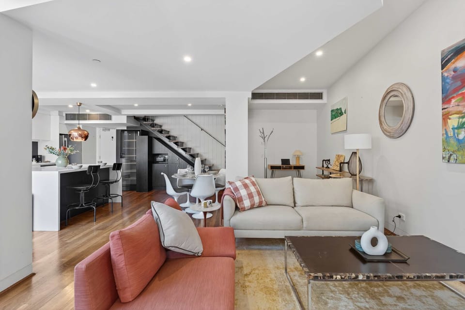 Relax in the cosy lounge area with space for up to four, a coffee table, and a TV for movie nights.