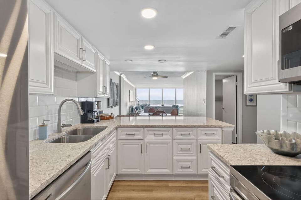 Elegant kitchen setup with all essentials for a comfortable and convenient stay.