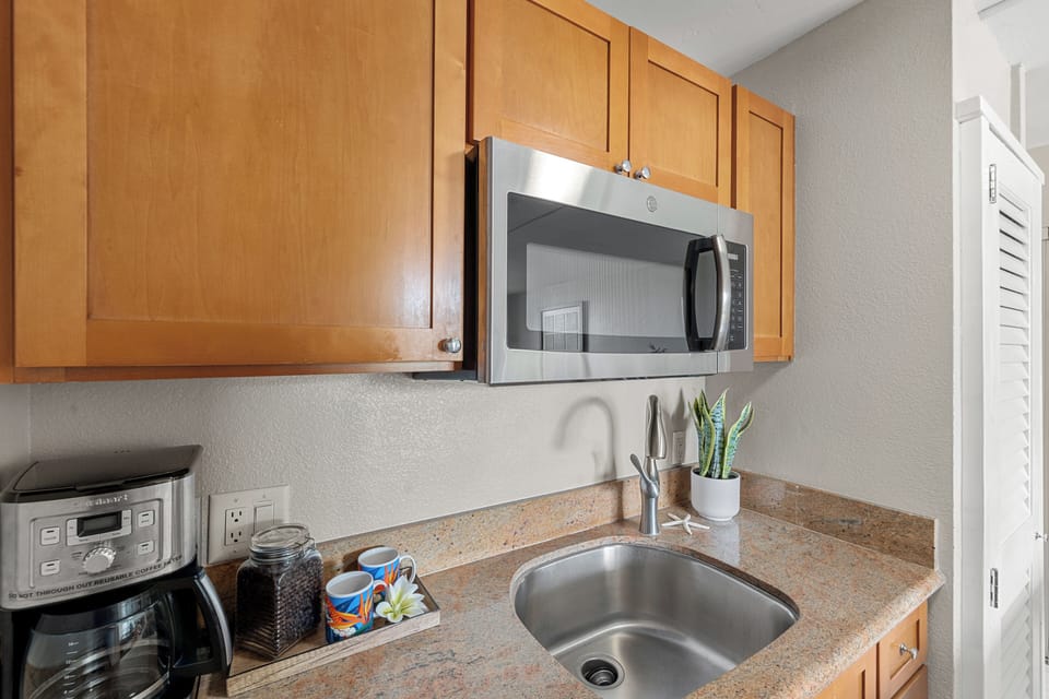 Functional Kitchen Space with Sink & Microwave