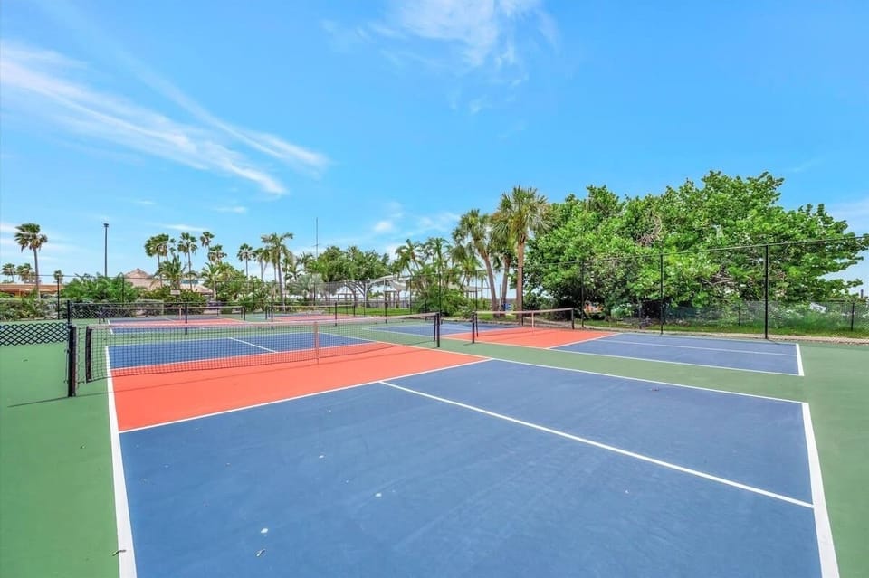Enjoy a friendly match or practice your serve on the vibrant tennis courts.