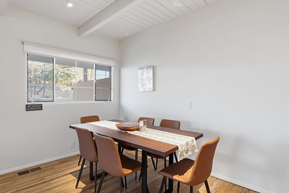 Bright kitchen with plenty of prep space and dining area just steps away