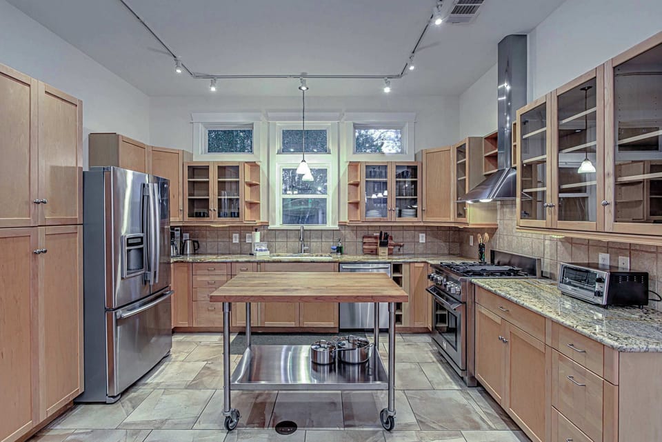Cook like a chef in this gourmet kitchen with granite countertops. | Unit A