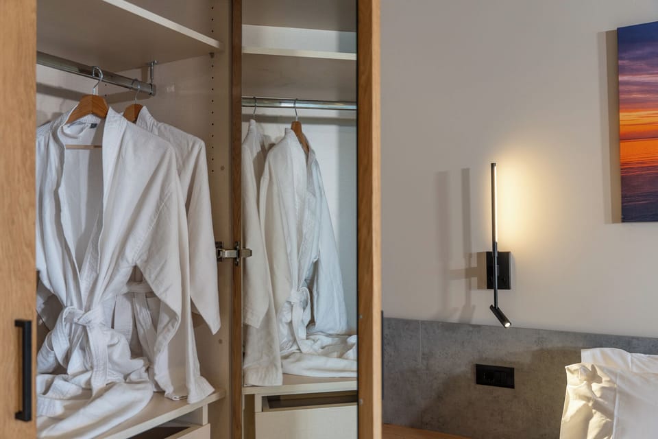 Seafront One Bedroom Cave Suite with Private Pool | In-room safe, blackout drapes, soundproofing, iron/ironing board