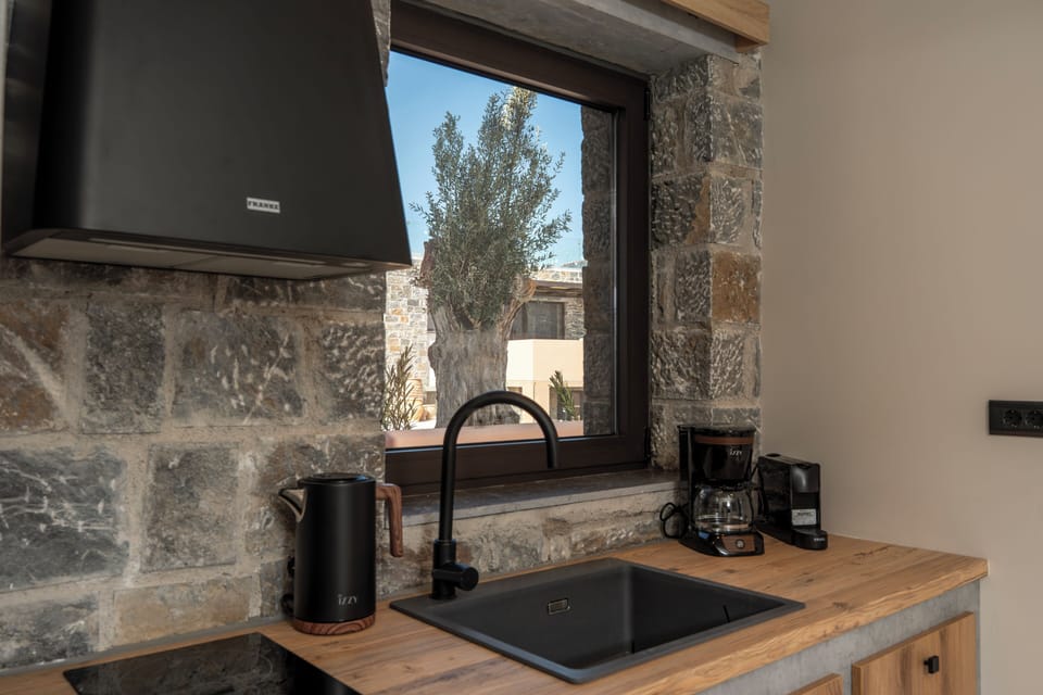 One Bedroom Suite with Private Pool | Private kitchen | Fridge, microwave, oven, coffee/tea maker