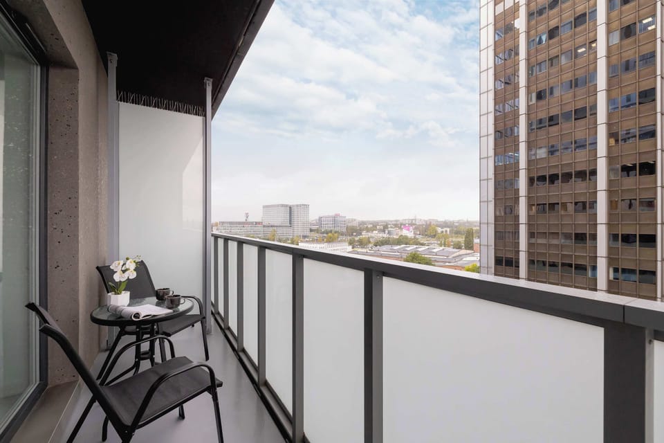 Balcony offers a peaceful retreat where you can enjoy your morning coffee and city views.