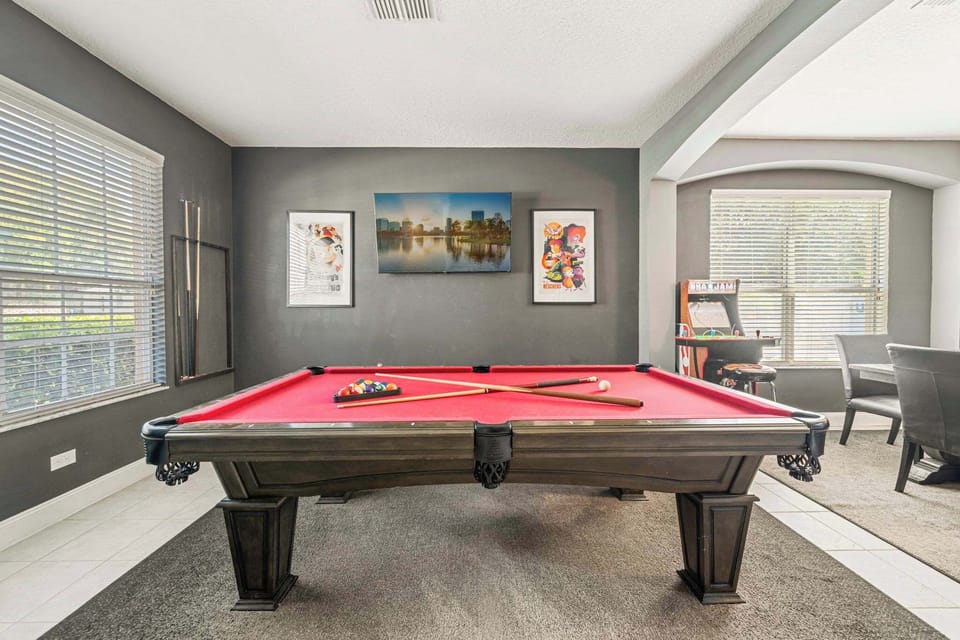 Stylish Game Lounge with Classic Red Pool Table