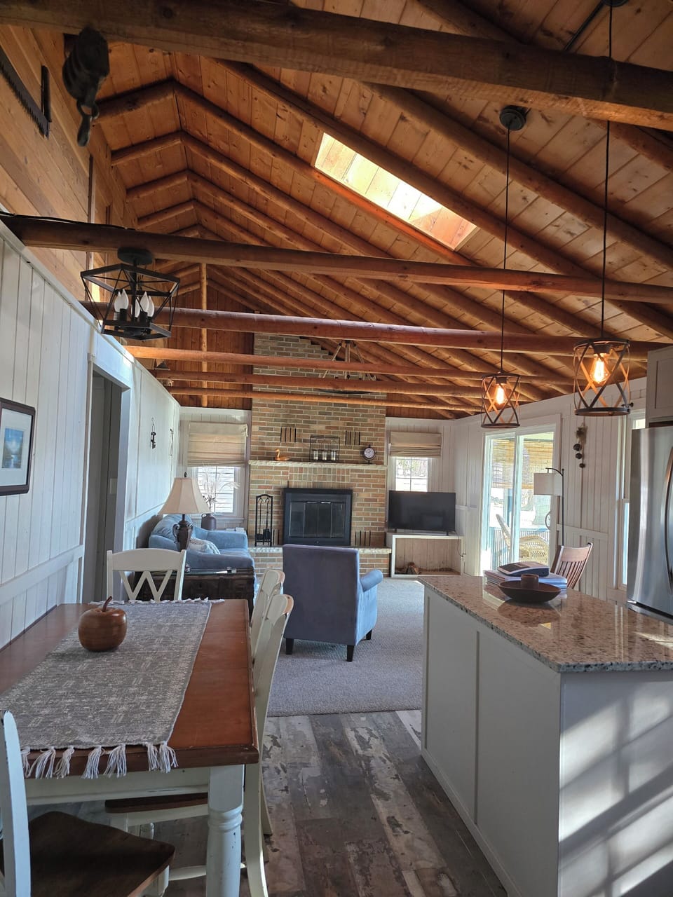Great room with fireplace & kitchen.