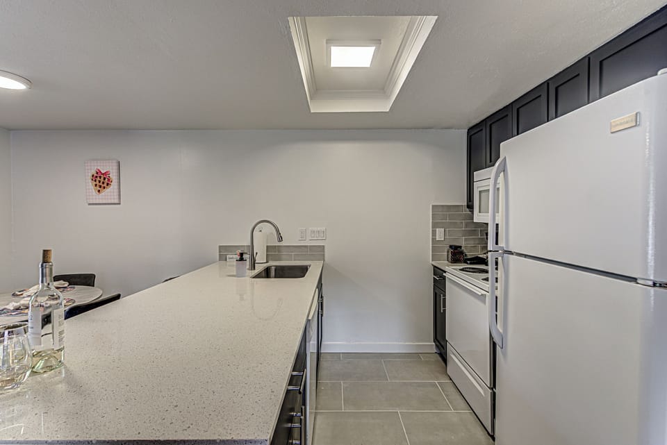 Fully stocked kitchen with coffee pot
