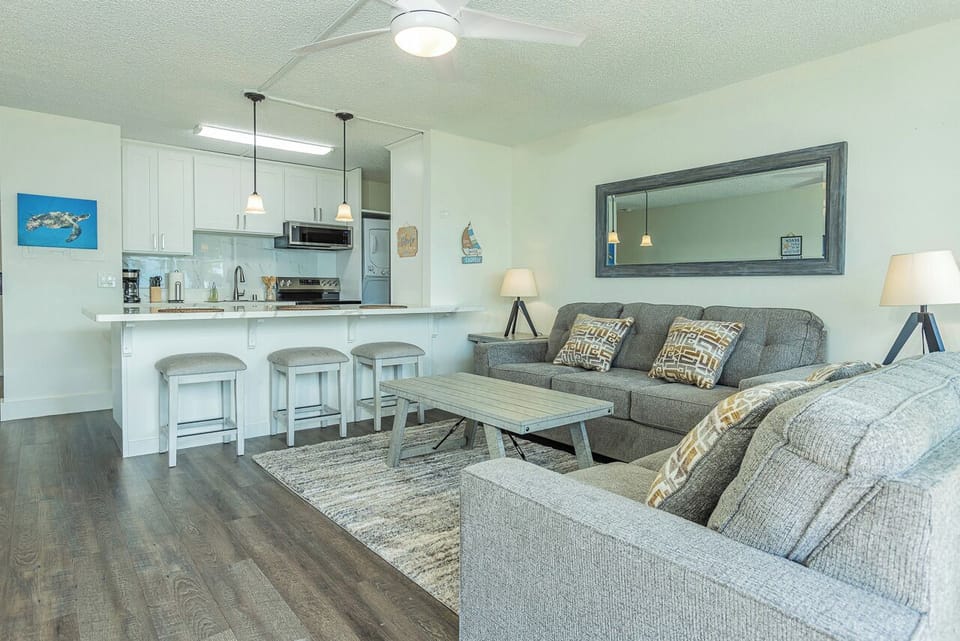 Bright kitchen with space for three to eat, chat, and unwind