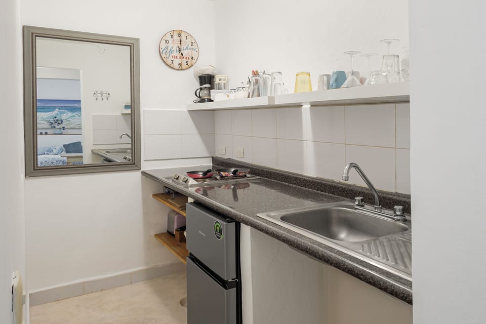 Traditional Quadruple Room, 1 Queen Bed with Sofa bed, Kitchenette, Pool View | In-room safe, individually decorated, individually furnished