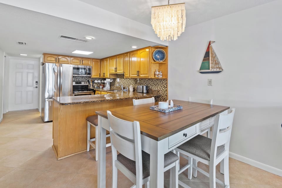 Condo, Multiple Beds, Balcony, Ocean View (Win-San A213) | Dining