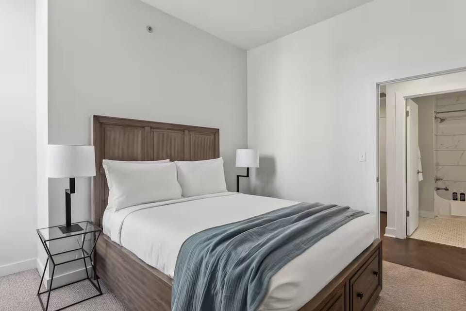 Drift off comfortably in a serene, hotel-style bedroom retreat.