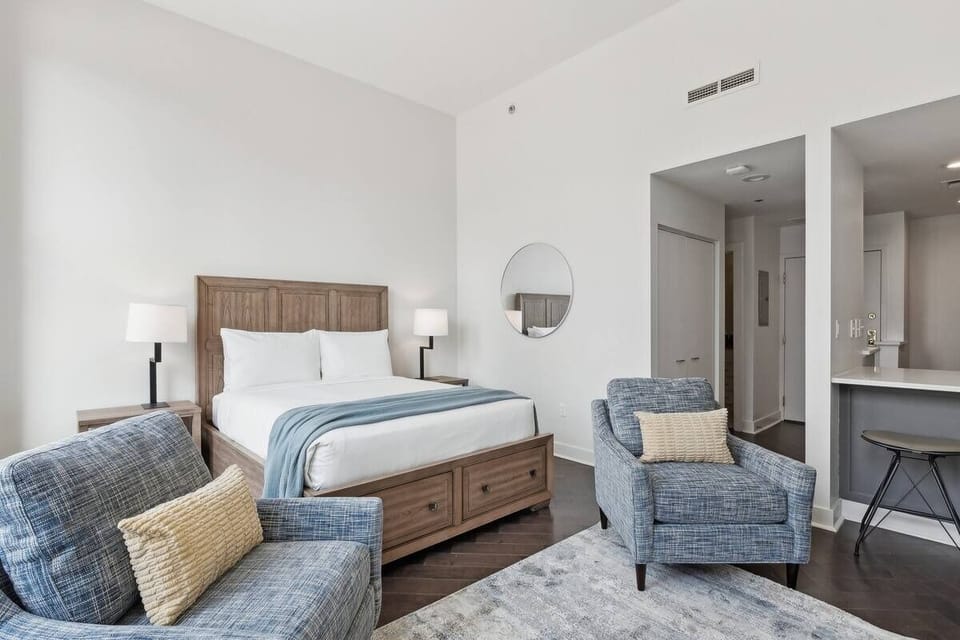 Settle in with open-concept comfort, plush seating, and serene style.