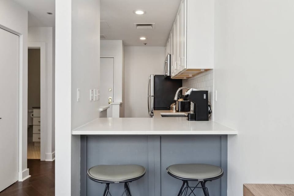 Gather at the breakfast bar for coffee and easy conversation.