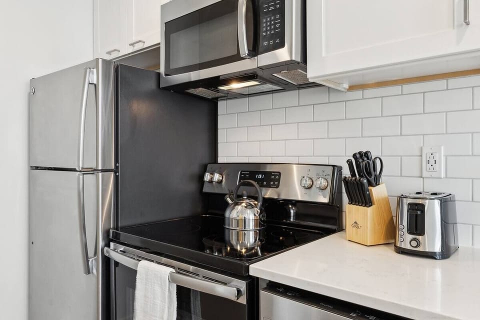 Whip up meals confidently with full-size range and ample prep space.