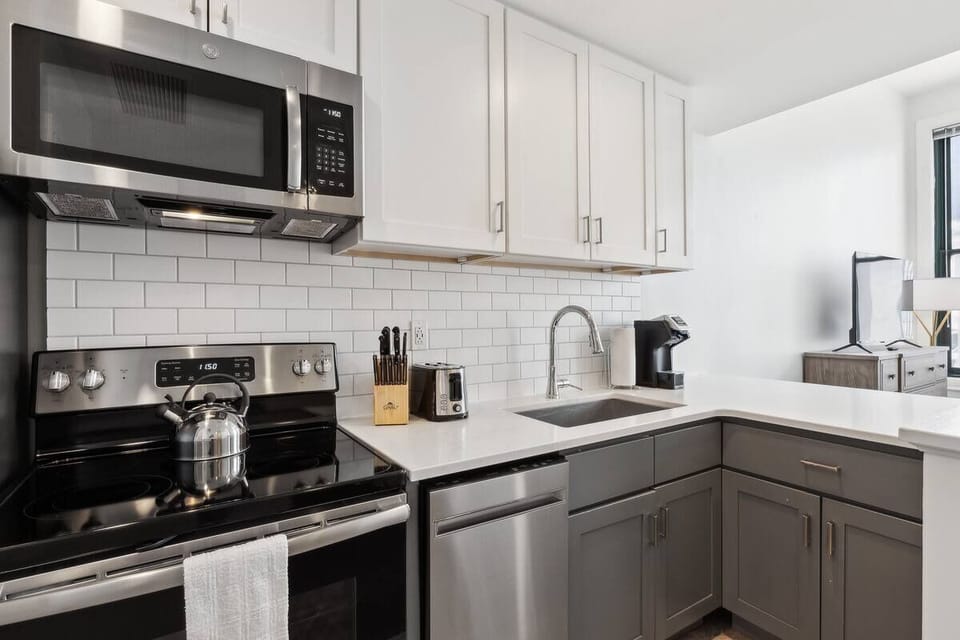 Cook with ease in a bright kitchen with modern appliances.