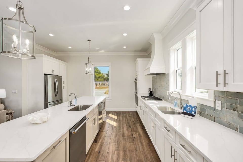 Cook with ease using the gas range and dual dishwashers for effortless cleanup.